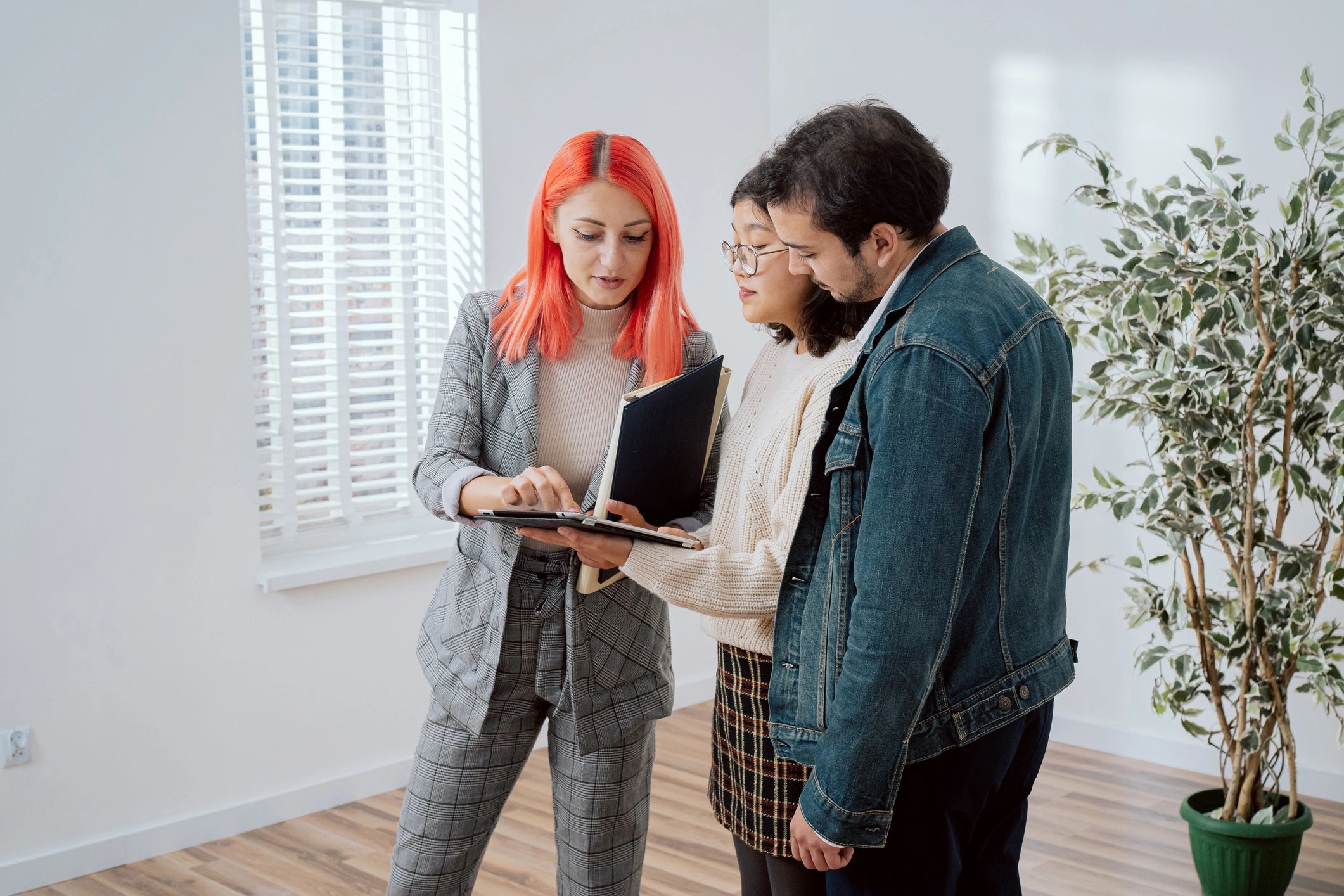 Homeowners meeting with a real estate advisor
