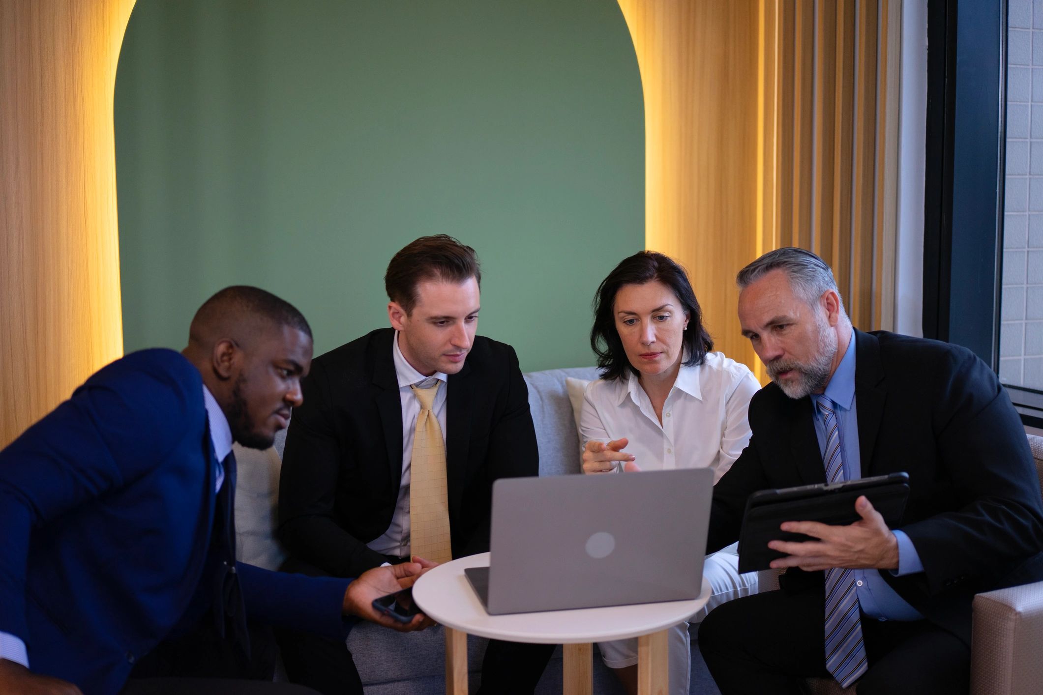 Real estate team meeting in a modern office